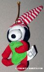 Snoopy wearing stocking cap and holding stocking Plush Ornament