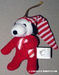 Snoopy wearing stocking cap and holding candy cane Plush Ornament