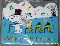 Snoopy and Woodstocks dancing with candy canes in snow Wooden Ornament
