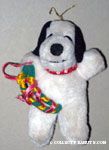 Snoopy wearing scarf and holding ribbon wreath Plush Ornament