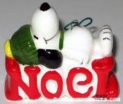Snoopy laying on Noel Ornament