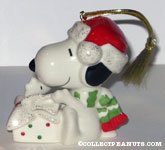 Snoopy and Woodstock opening Christmas Gift Ornament