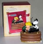 Snoopy dancing on Schroeder's Piano Ornament