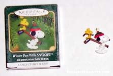 Snoopy and Woodstock carrying hockey sticks Miniature Christmas Ornament