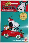 Snoopy driving red beetle Ornament