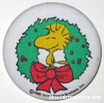 Woodstock standing in Christmas wreath Fabric-covered Button