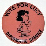 Lucy making fist 'Vote for Lucy Diplomatic Service' Button