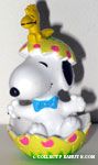 Snoopy cracking out of egg with Woodstock on his head Easter PVC Figure - Yellow