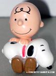 Charlie Brown with Snoopy in his lap PVC Figurine