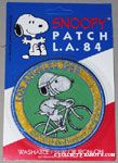 Snoopy biking on rings Patch