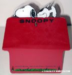 Snoopy laying on doghouse Picture Frame