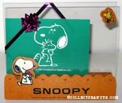 Snoopy holding flower bouquet and Woodstock flying Picture Frame