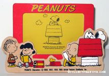 Peanuts Gang reading by Snoopy's doghouse Wooden Picture Frame