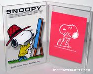 Snoopy painting at easel Picture Frame