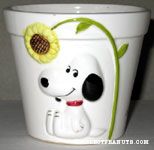 Snoopy sitting under flower Planter