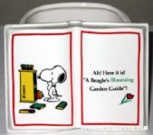 Snoopy looking at bookshelf Planter