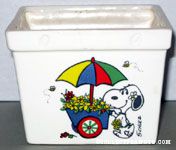 Snoopy pushing flower cart Planter
