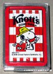 Snoopy wearing hat throwing cards over shoulder - Knott's Berry Farm Playing Cards