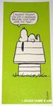 Snoopy on Doghouse 'I always thought you got a headache because your ears were too tight' Postcard