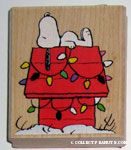 Snoopy on Christmas lighted doghouse Rubber Stamp