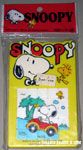 Snoopy driving car with Woodstock and palm trees Sliding Picture Puzzle