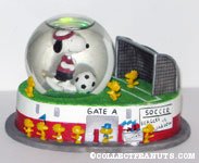 Snoopy and Woodstocks playing Soccer Snowglobe