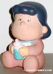 Lucy as baby holding bottle Squeaky Toy