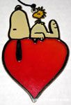 Snoopy laying on Heart Sun Catcher