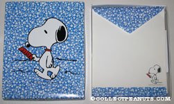 Snoopy reading paper on blue flower background Stationery