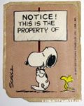 Snoopy carrying sign