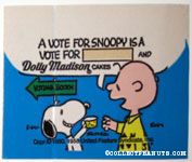 Snoopy giving Charlie Brown cake