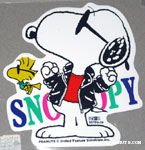 Joe Cool flexing with Woodstock Sticker