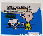 Snoopy giving Charlie Brown cake