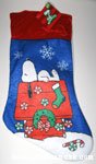 Snoopy laying on decorated doghouse Stocking