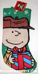 Charlie Brown holding gift Christmas Stocking