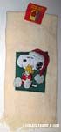 Santa Snoopy hugging Woodstock