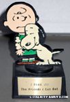 Snoopy hugging Charlie Brown