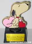 Kissing Snoopy with Hearts 'Affection Needed Immediately' Trophy
