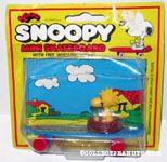 Woodstock in Nest on blue skateboard