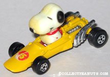 Snoopy in yellow race car 