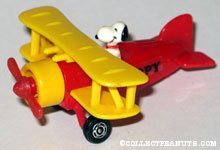 Snoopy pilot in yellow & red bi-plane