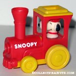 Snoopy driving a Train Engine
