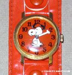 Snoopy dancing on orange Face with orange snap band