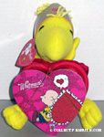 Woodstock wearing crown Plush & Charlie Brown sitting against heart Chocolate Box