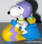 Snoopy riding scooter Easter PVC Figurine