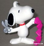 Snoopy with scissors cutting pink hearts Valentine's Keychain