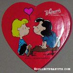 Lucy smiling at Schroeder on top of his piano Valentine's Heart-shaped Candy
