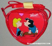 Lucy smiling at Schroeder on top of his piano Valentine's Heart-shaped Candy Box in Purse