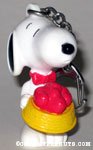 Snoopy holding dog dish of hearts PVC Keychain