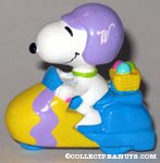Snoopy riding scooter Easter PVC Figurine